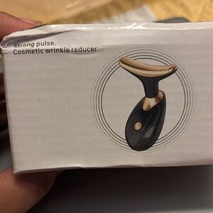 Black and Gold Cosmetic Wrinkle Reducer